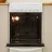 Aragaz electric Indesit IS5V4PHW, 61 l, 4 arzatoare, Grill, Timer, Curatare hidroliza, 50 cm, Alb, Negru, A