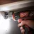 Masina de gaurit si insurubat MILWAUKEE M12BDDXKIT-202C Masina de gaurit si insurubat cu acumulator MILWAUKEE 4933447836